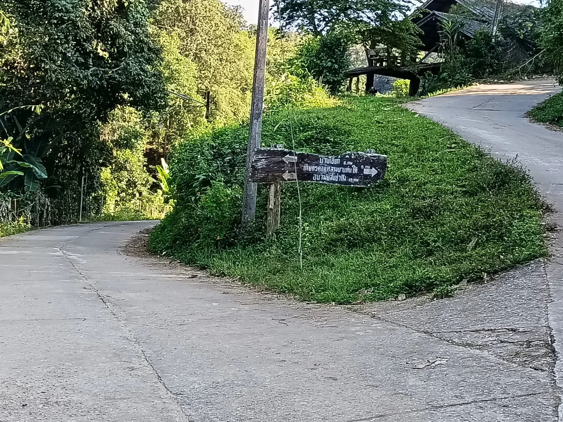 After the village you cross a bridge , the road gets worse